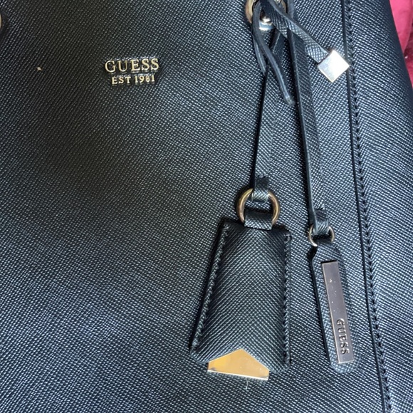 GUESS - Brand new Guess tote handbag in black. Multiple sections with pockets. - Picture 4 of 9